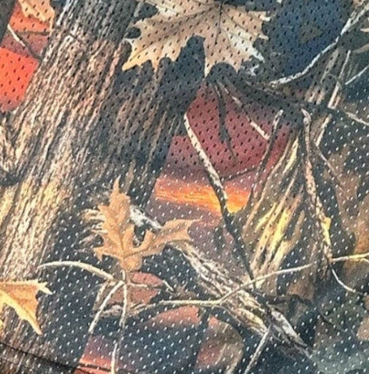 Close-up of RF-Wear Men's Mesh Tree Camo Shorts in Sunset