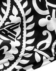 Close-up if RF-Wear Men's Paisley 2.0 Shorts in Black/White with RF logo