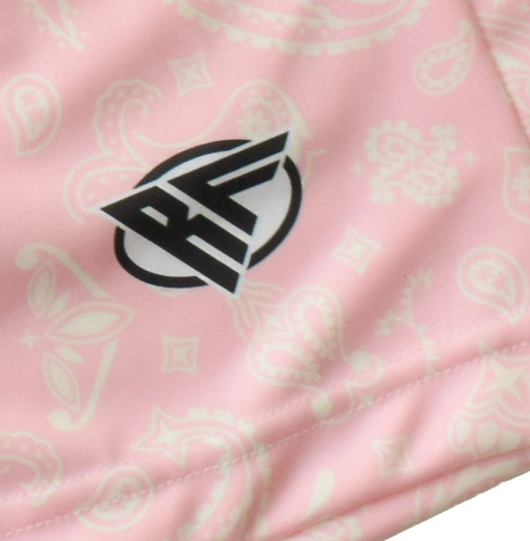 Close-up of RF-Wear Men's Paisley Shorts in Pink/Cream with RF logo