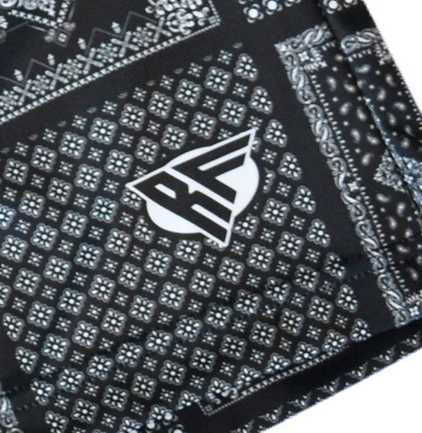 Close-up of RF-Wear Men's Bandana Patchwork Shorts in Black with RF logo