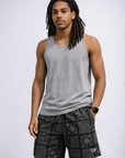 Man wearing a grey tank top and RF-Wear Men's Bandana Patchwork Shorts in Black
