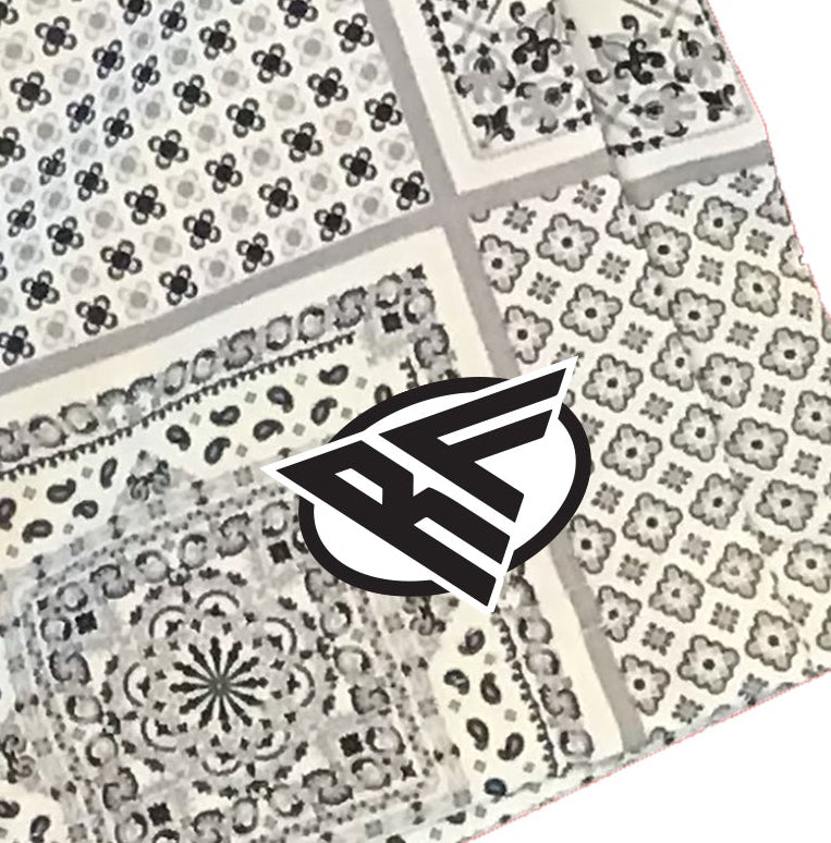Close-up of RF-Wear Patchwork Bandana Shorts in Cream/Grey with RF logo