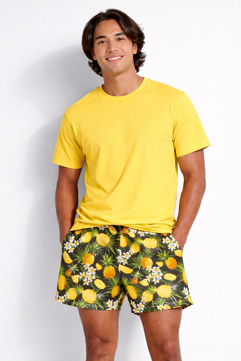 Man wearing a yellow t-shirt and Men's RF-Wear Pineapple Paradise Shorts