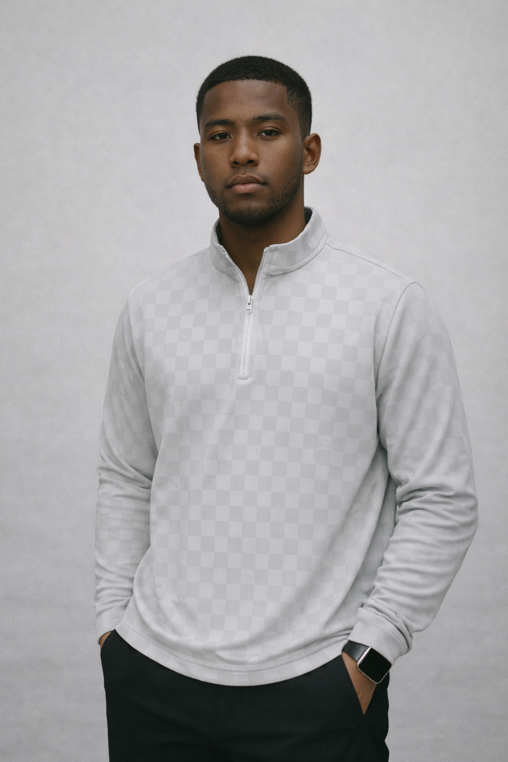 Man wearing a RF-Wear Men's Quarter Zip Checkered Top in Grey