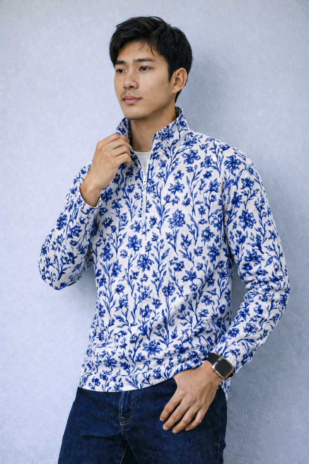 Man wearing a RF-Wear Men's Quarter Zip Porcelain Top  in Blue/White  and Jeans