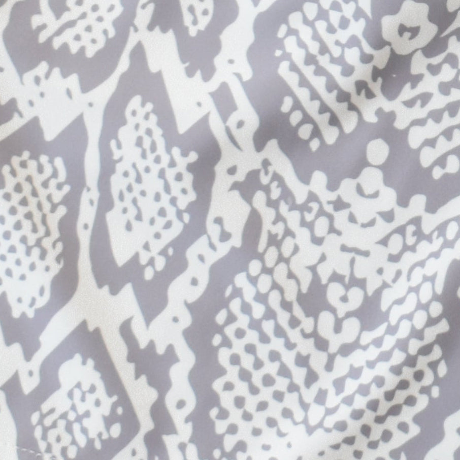 Close-up of RF-Wear Men's Snakeskin Shorts in Cream/Grey