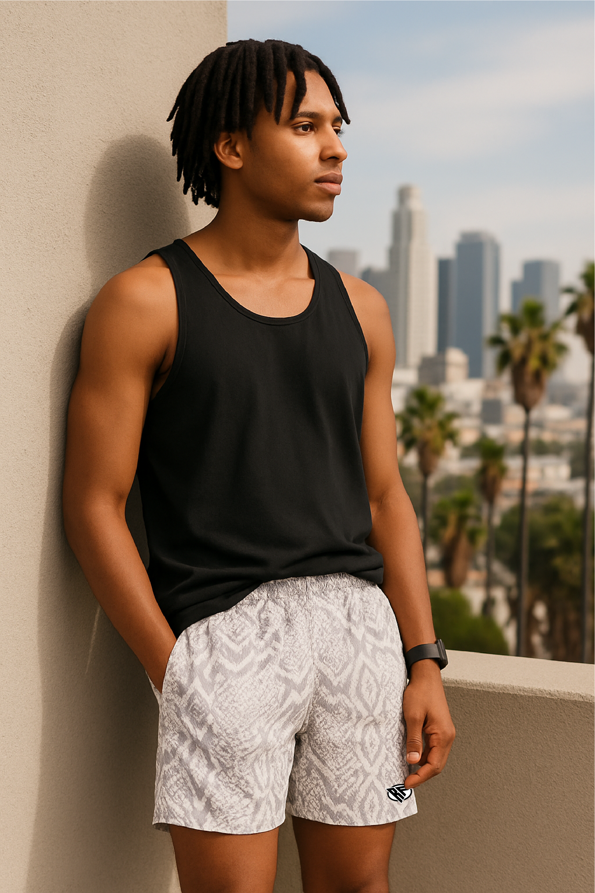 Man wearing a black tank top and RF-Wear Men's Snakeskin Shorts in Cream/Grey 