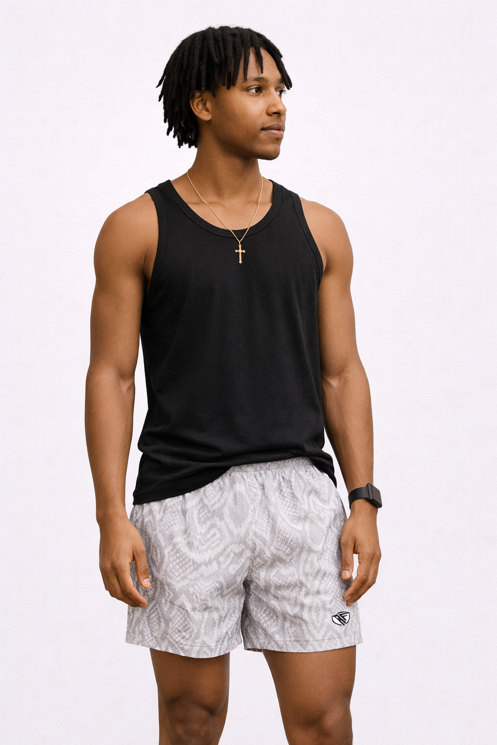 Man wearing a black tank top and RF-Wear Men's Snakeskin Shorts in Cream/Grey 