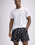 Man wearing  white t-shirt with RF-Wear Men's Sparks Shorts in Black/White
