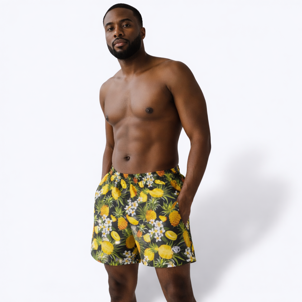 Man wearing RF-Wear Men's Swim Trunks in Pineapple Paradise