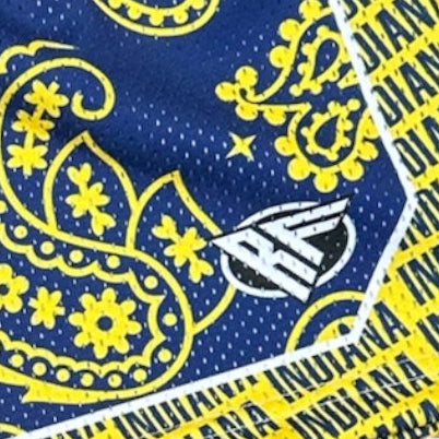 Close-up of RF-Wear Men's Mesh Basketball Paisley Indiana  Shorts in Yellow/Blue with RF logo