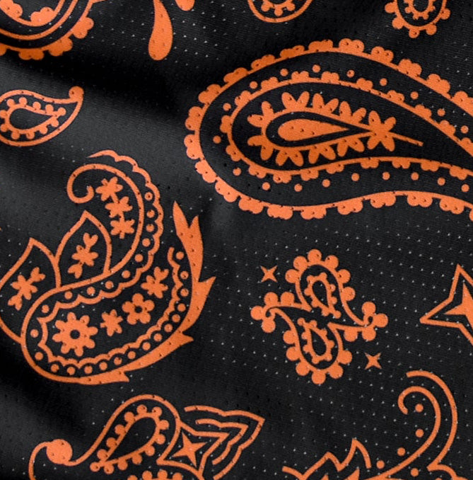 Close-up of RF-Wear Men's Mesh Paisley Shorts in Black/Orange 