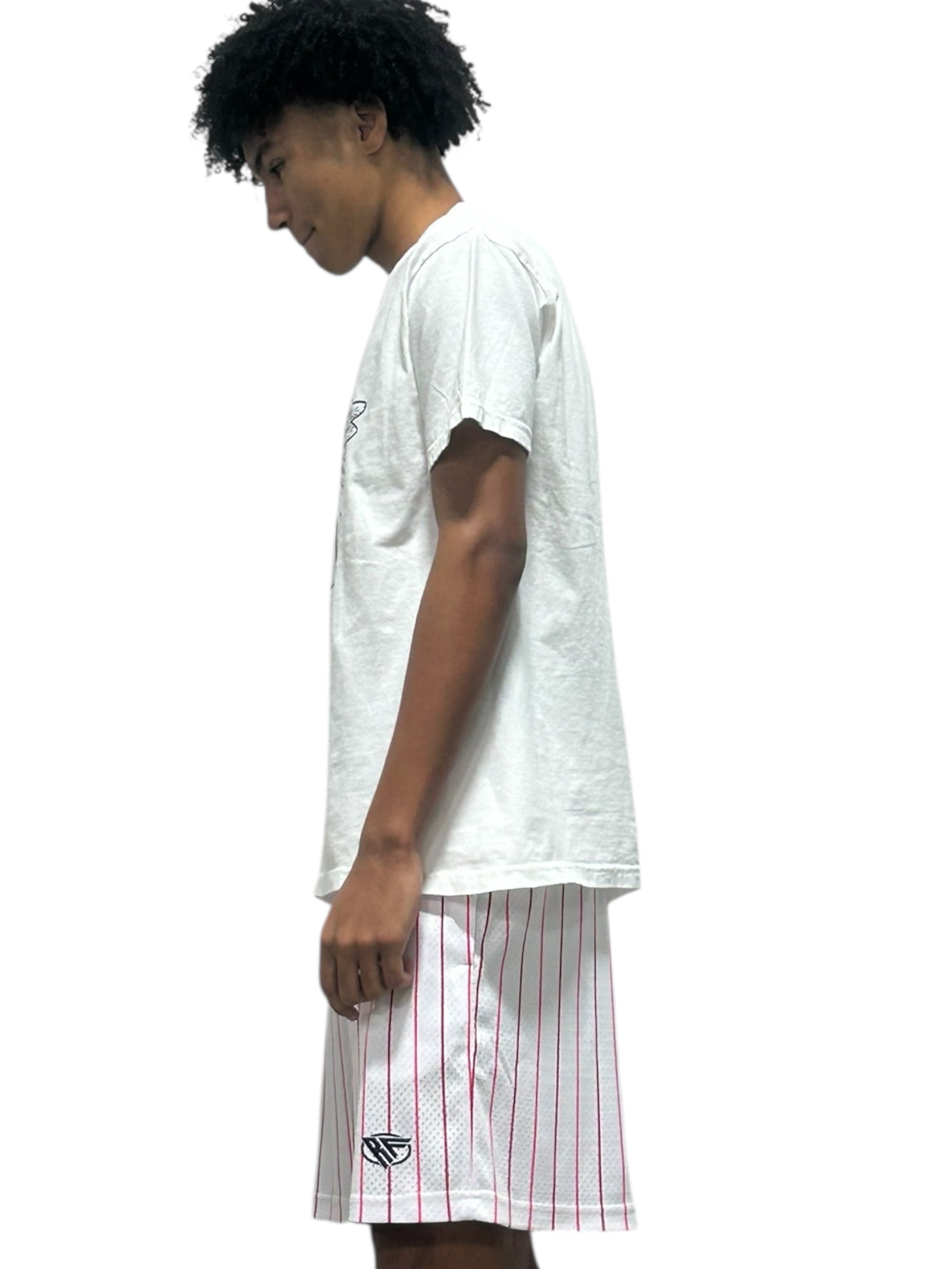 Man wearing a white untucked t-shirt with RF-Wear men's mesh pinstripe shorts in white with pink pinstripes.