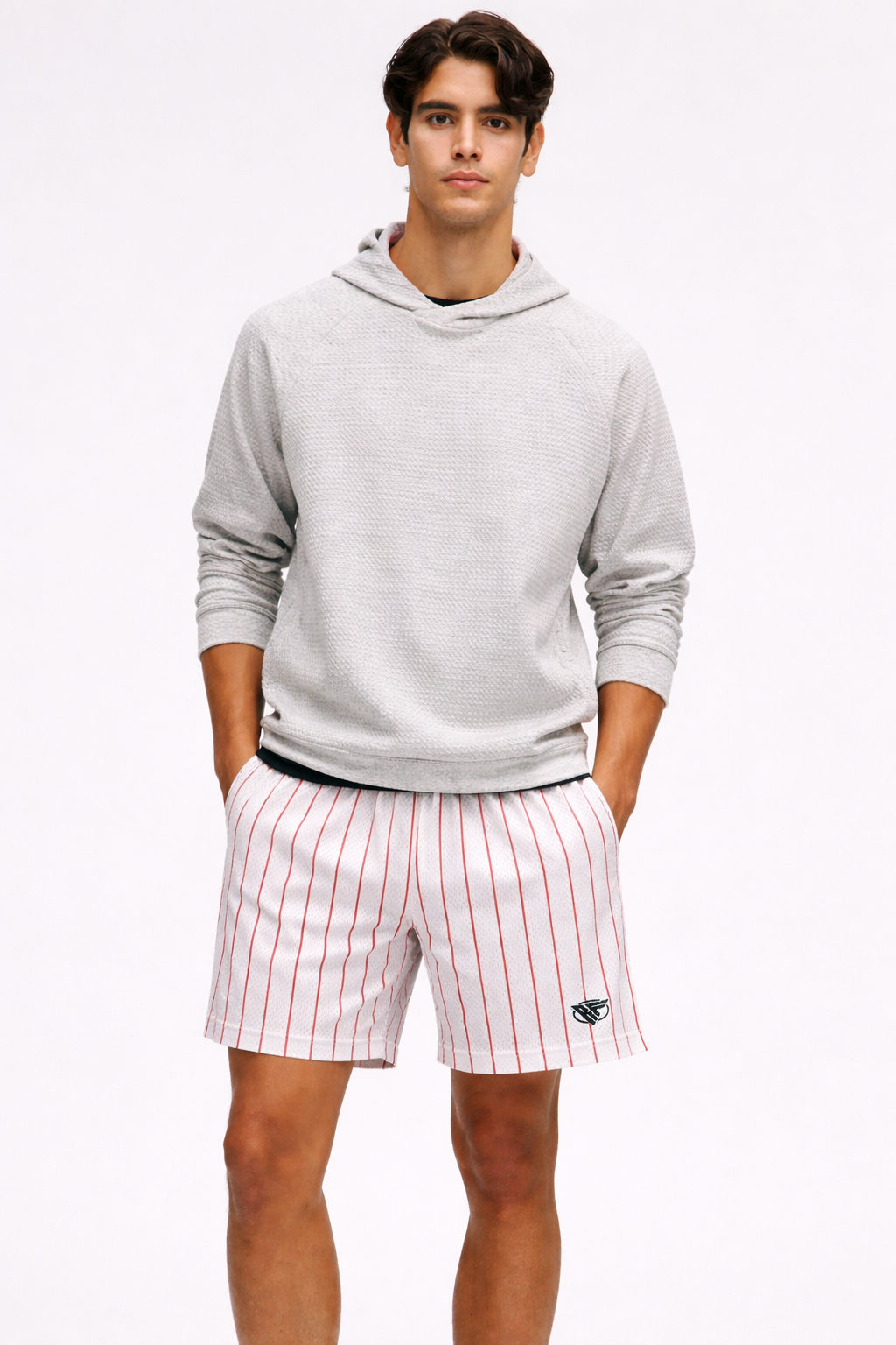 Man wearing a light grey hoodie and RF-Wear Men's Mesh Pinstripe Shorts- Pink on White