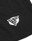 Close-up of RF-Wear men's mesh solid color shorts in black with RF logo
