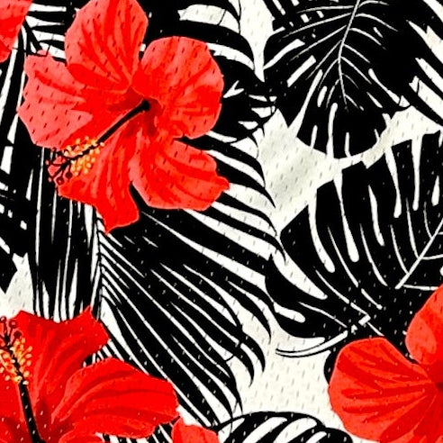 Close up of RF-Wear Men's Mesh Tropical Flower shorts - Coral on Black/White
