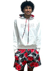 Man wearing RF-Wear Tropical Flower Hoodie and shorts.