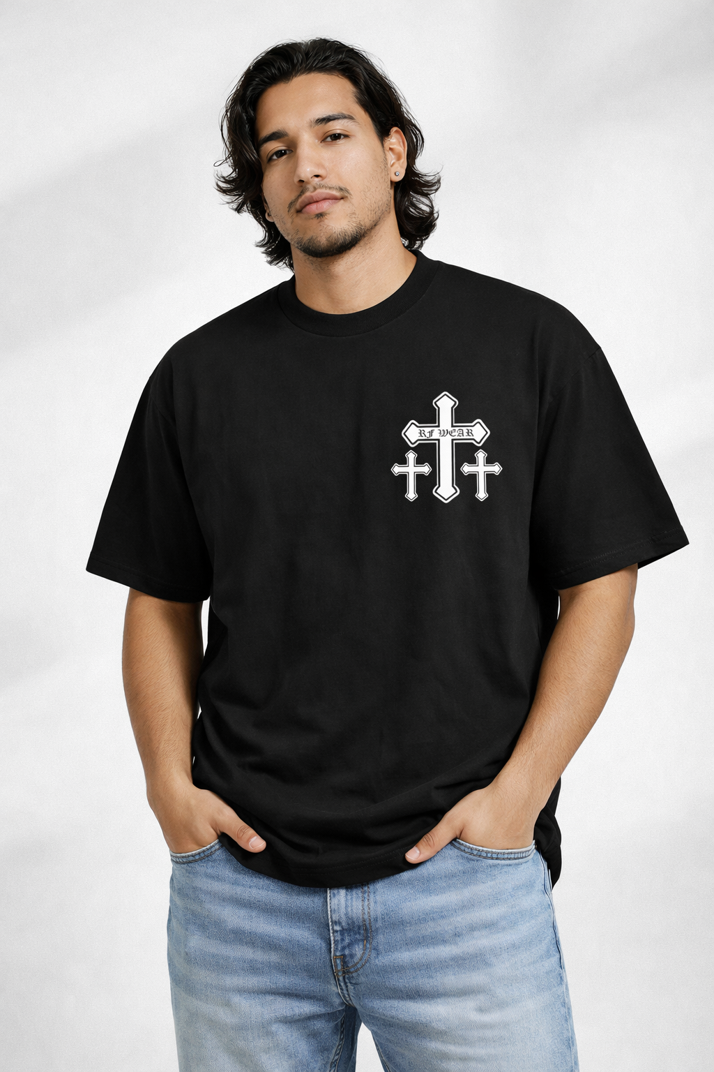 Man wearing jeans and RF-Wear Cross T-Shirt in Black
