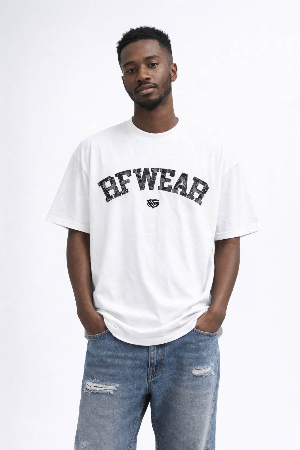 Man wearing jeans and RF-Wear Desert Camo T-Shirt in White