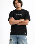 Man wearing jeans and RF-Wear Mini Print T-Shirt in Black