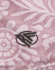 Close-up of RF-Wear Paisley Shorts in Mauve/White with RF logo