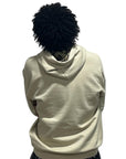 Man standing wearing RF-Wear Plaid Smile Hoodie in Sand. Back View.