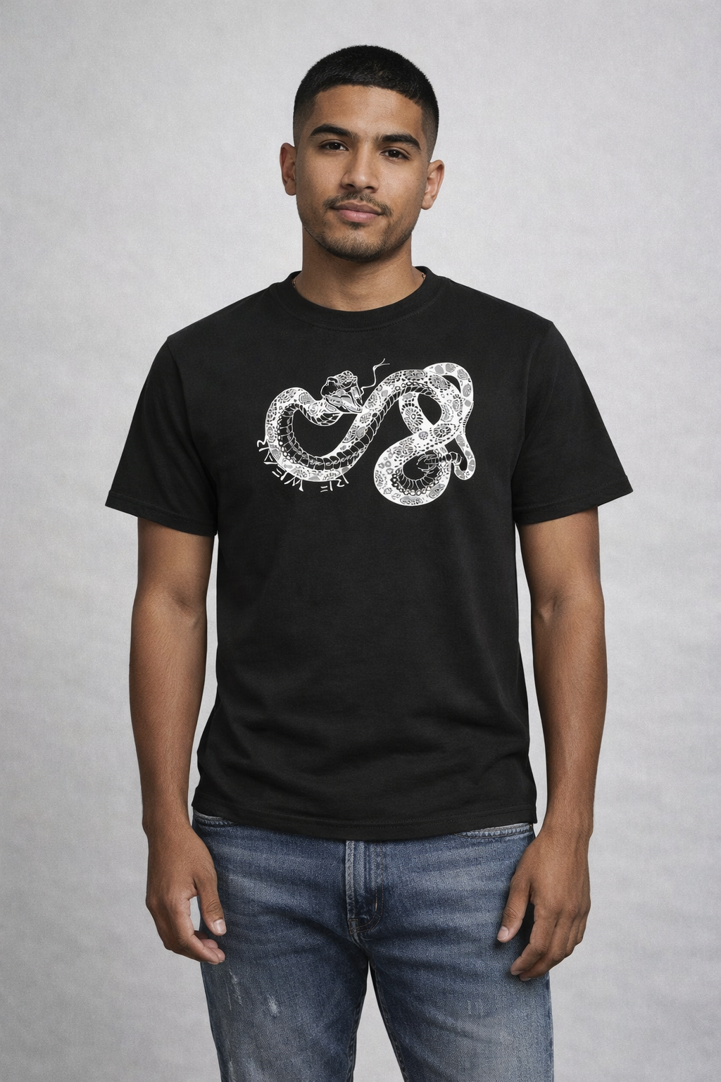 Man wearing jeans and a RF-Wear Snake T-Shirt in Black