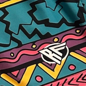 Close-up of RF-Wear Swim Trunks Lined Striped Summer Vibes with RF logo