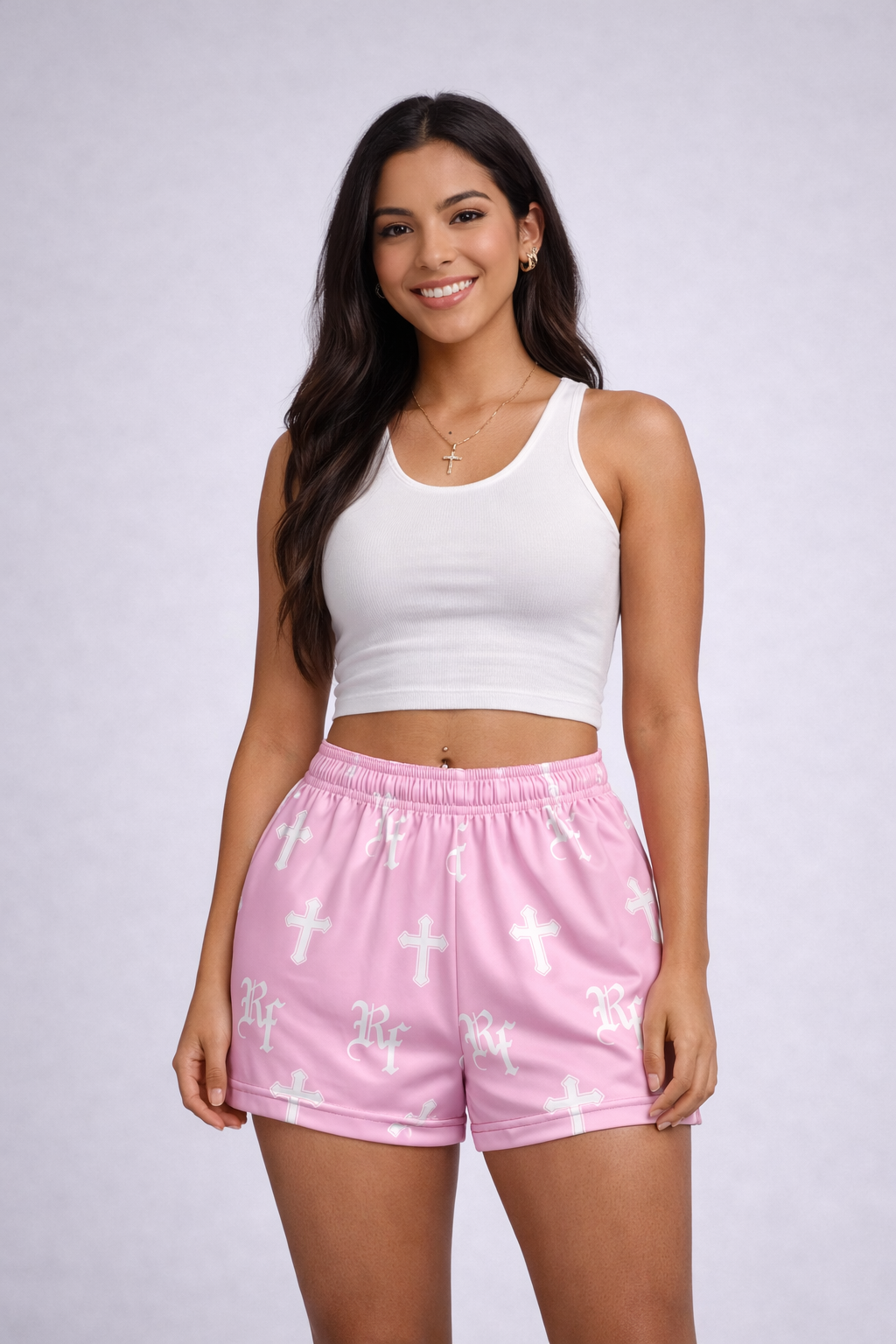 Woman in a white crop tank top and RF-Wear Women's Cross Shorts in Pink
