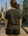 RF Wear Unisex Solid Color Short Sleeve T-Shirt - Sandstone - Female Model Back View