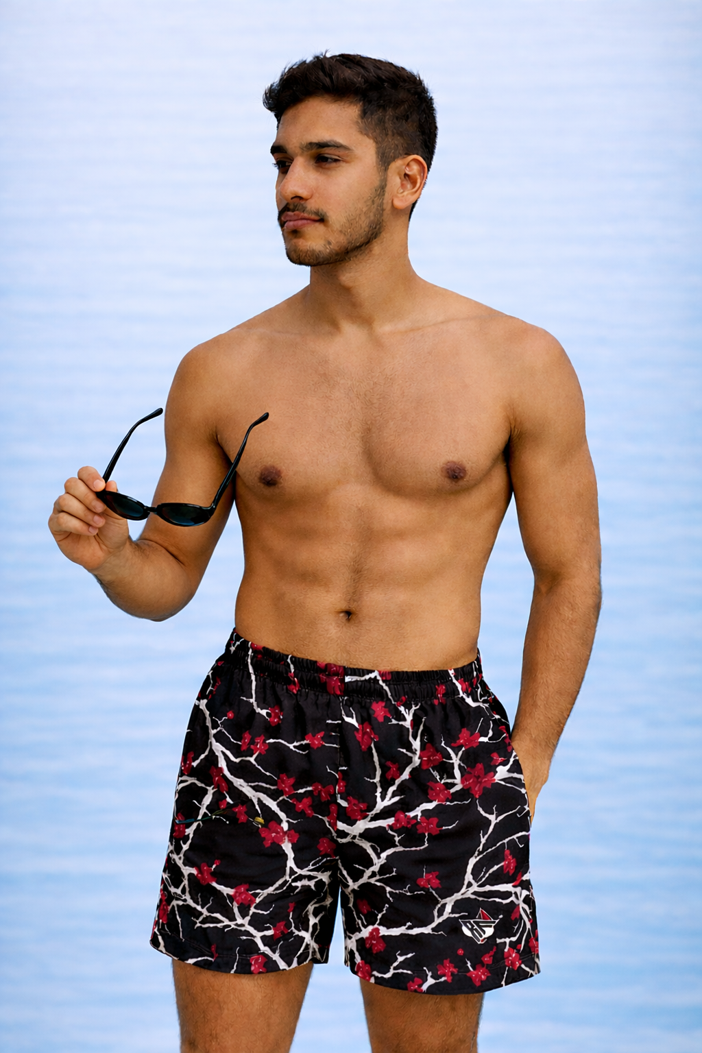 man wearing RF-Wear Swim Trunks - Blossom (Lined) in Black/White