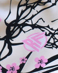 Close-up of RF-Wear Swim Trunks - Cherry Blossom (Lined) in Cream with RF logo