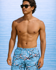 Man wearing RF-Wear Swim Trunks - Blossom (Lined) in Sky Blue 