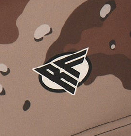 Close-up of RF-Wear Swim Trunks - Desert Camo (Lined) in Brown with RF logo