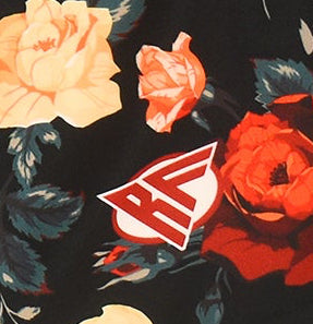 Close-up of RF-Wear Swim Trunks - Floral (Lined) in Black/Multicolored with RF logo