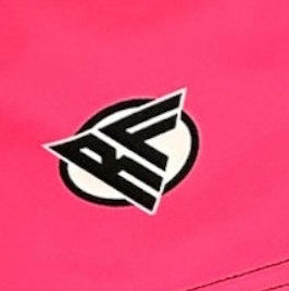 Close-up of RF-Wear Swim Trunks - Split Flamingo in Pink/Black with RF logo