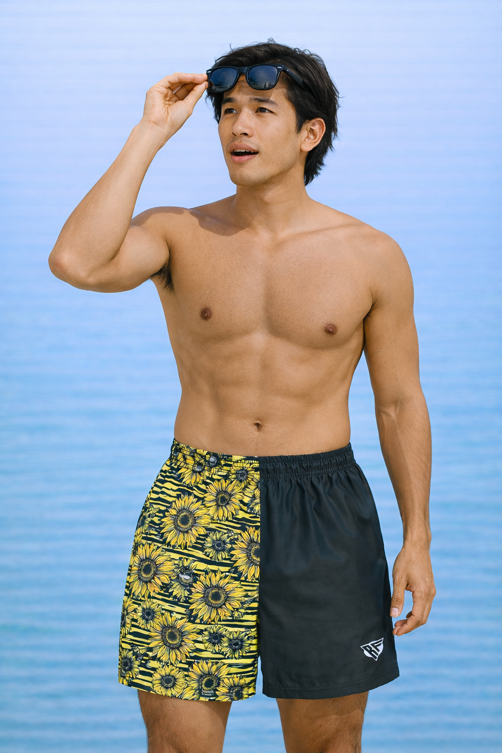 Man wearing RF-Wear Swim Trunks - Split Sunflower in Black/Yellow