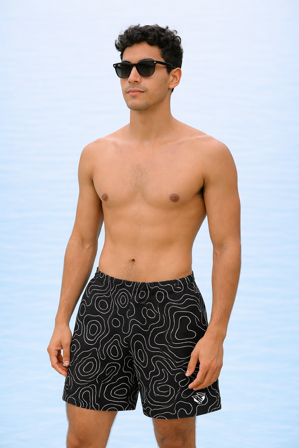 Man wearing RF-Wear Swim Trunks - Topograpy (Lined) in Black