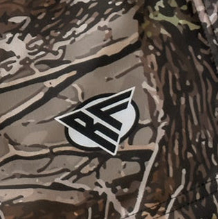 Close-up of RF-Wear Swim Trunks Tree Camo (Lined) in Tan with RF logo