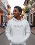 Person wearing a white hoodie with 'RF-WEAR' text on a street.