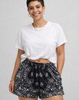 Woman wearing RF-Wear Women's Bandana Shorts in Black
