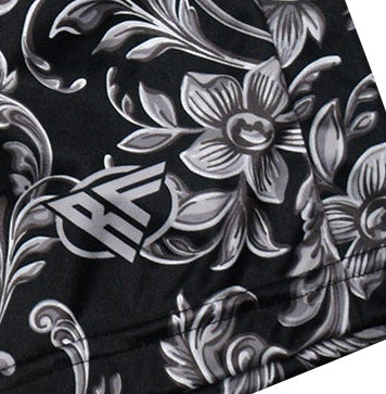 Close-up of RF-Wear Women's Baroque Shorts in Black with RF logo