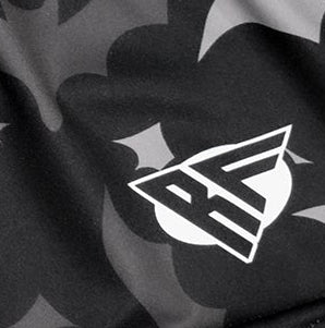 Close-up of RF-Wear Women's Bats Shorts in Black/Grey with RF logo