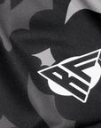 Close-up of RF-Wear Women's Bats Shorts in Black/Grey with RF logo