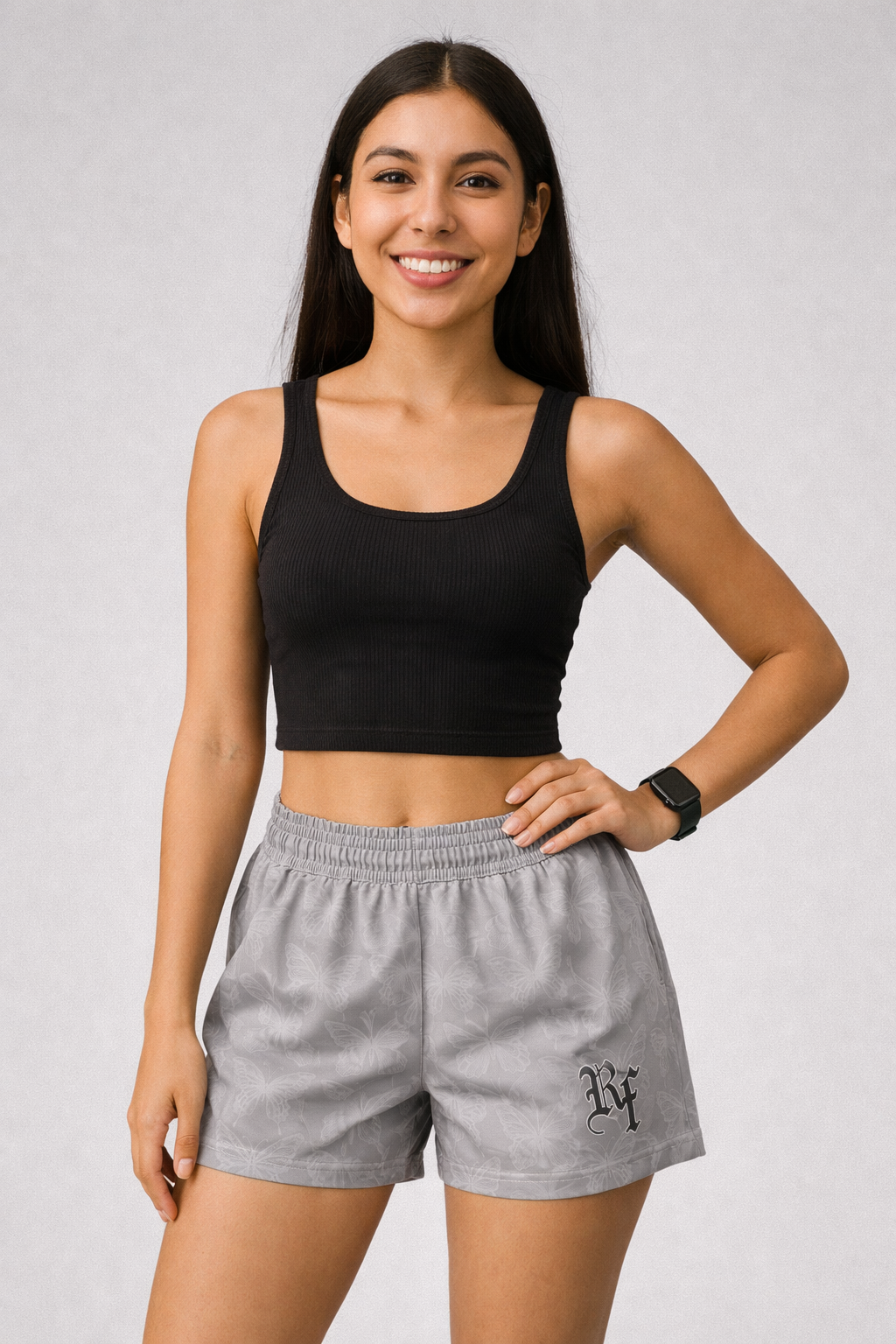 Woman wearing a black top and RF-Wear Women's Butterfly Shorts in Grey 