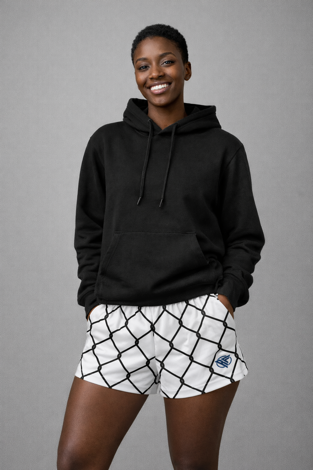 Woman wearing a black hoodie and RF-Wear Women's Chain Link Shorts in White