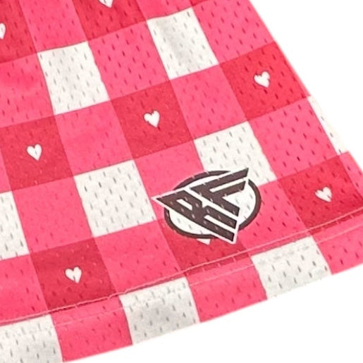 Close-up of RF-Wear Women's Checkered Heart Shorts in White & Pinks with RF logo.