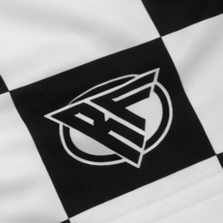 Close-up of RF-Wear Women's Checkered Shorts in Black/White with RF logo