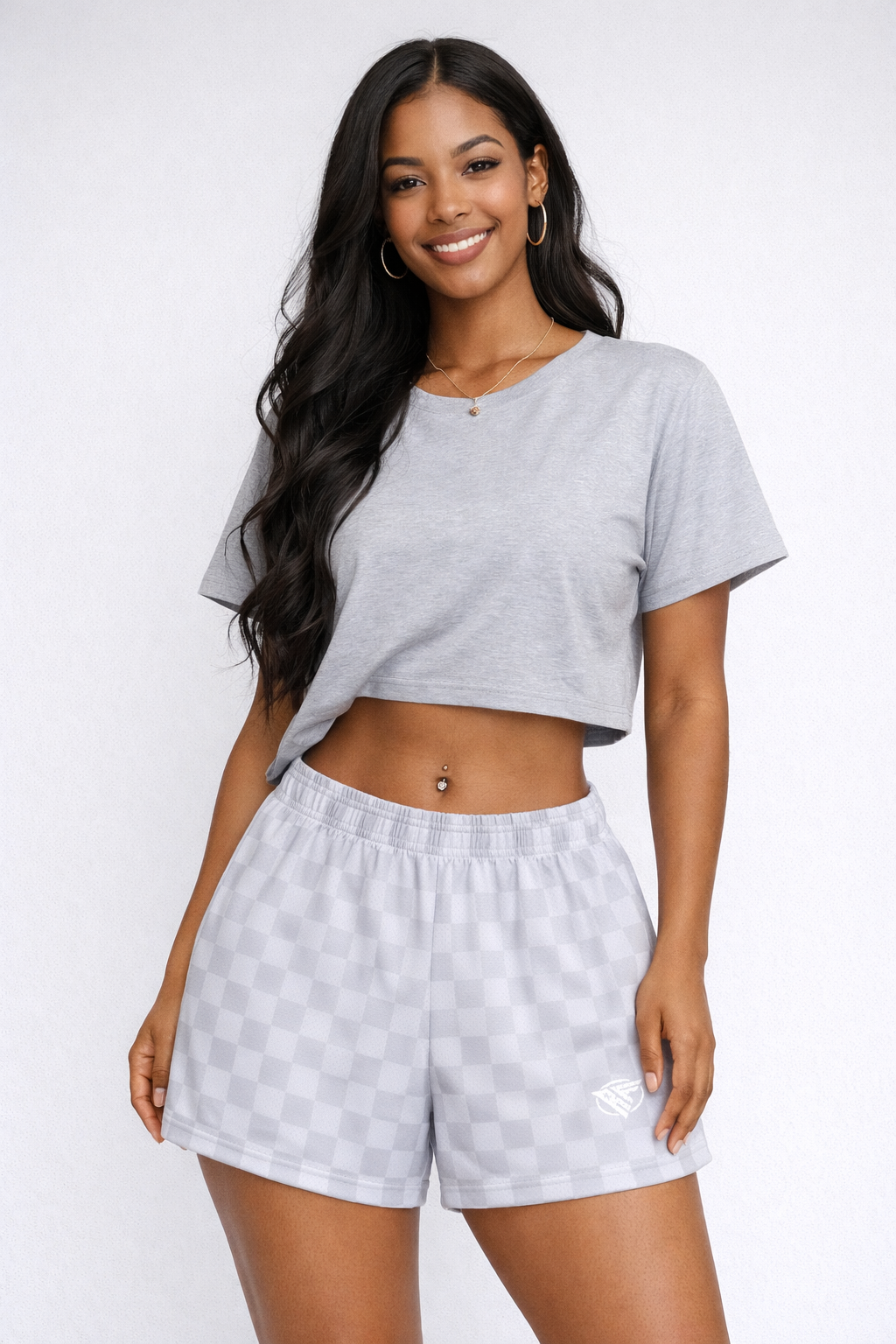 Woman wear a grey top and RF-Wear Women's Checkered Shorts in Grey