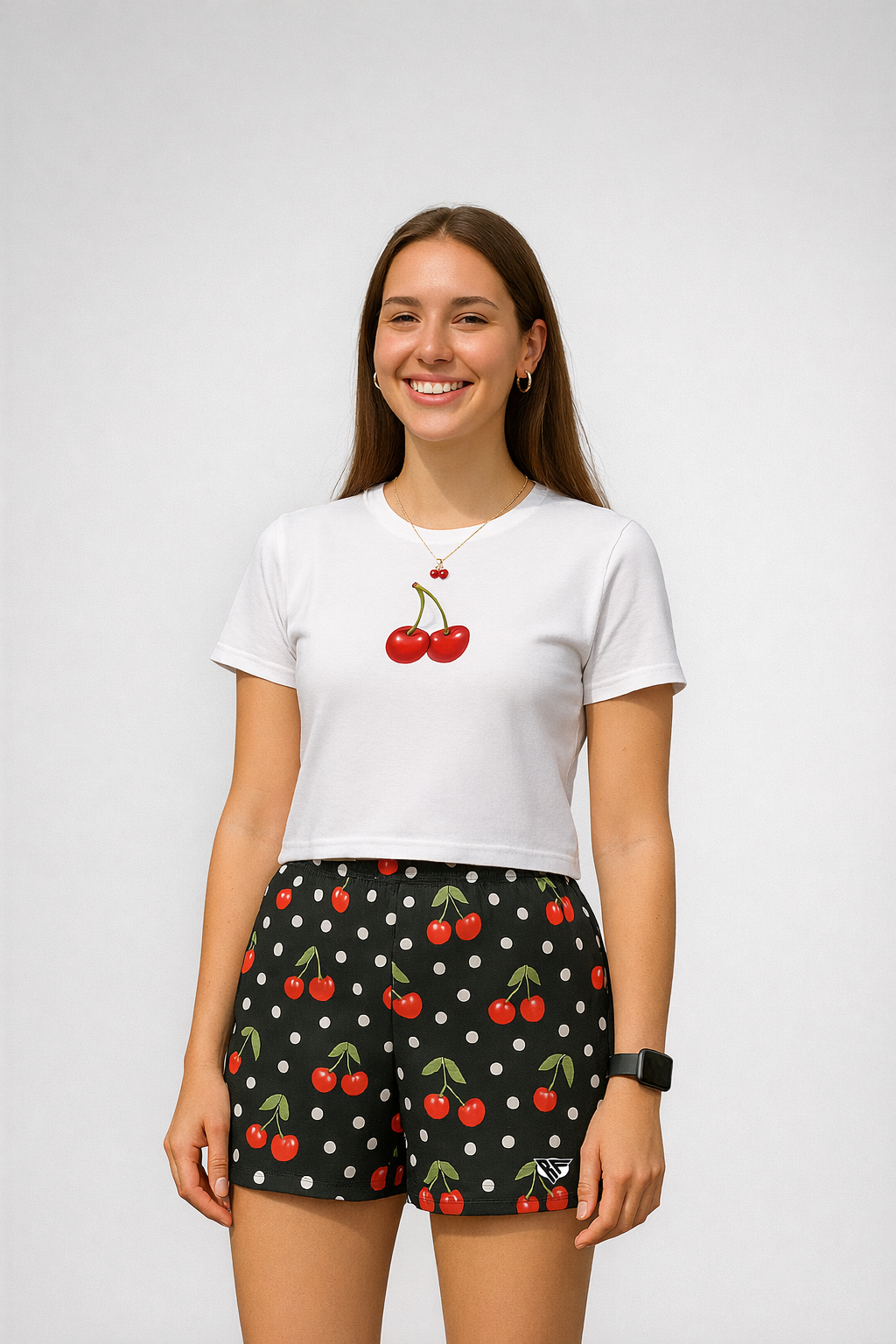 Woman wearing RF-Wear Women's Cherry Polka Dot Shorts in Black/White/Red